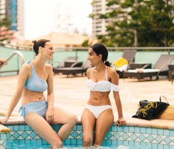 two womans on pool