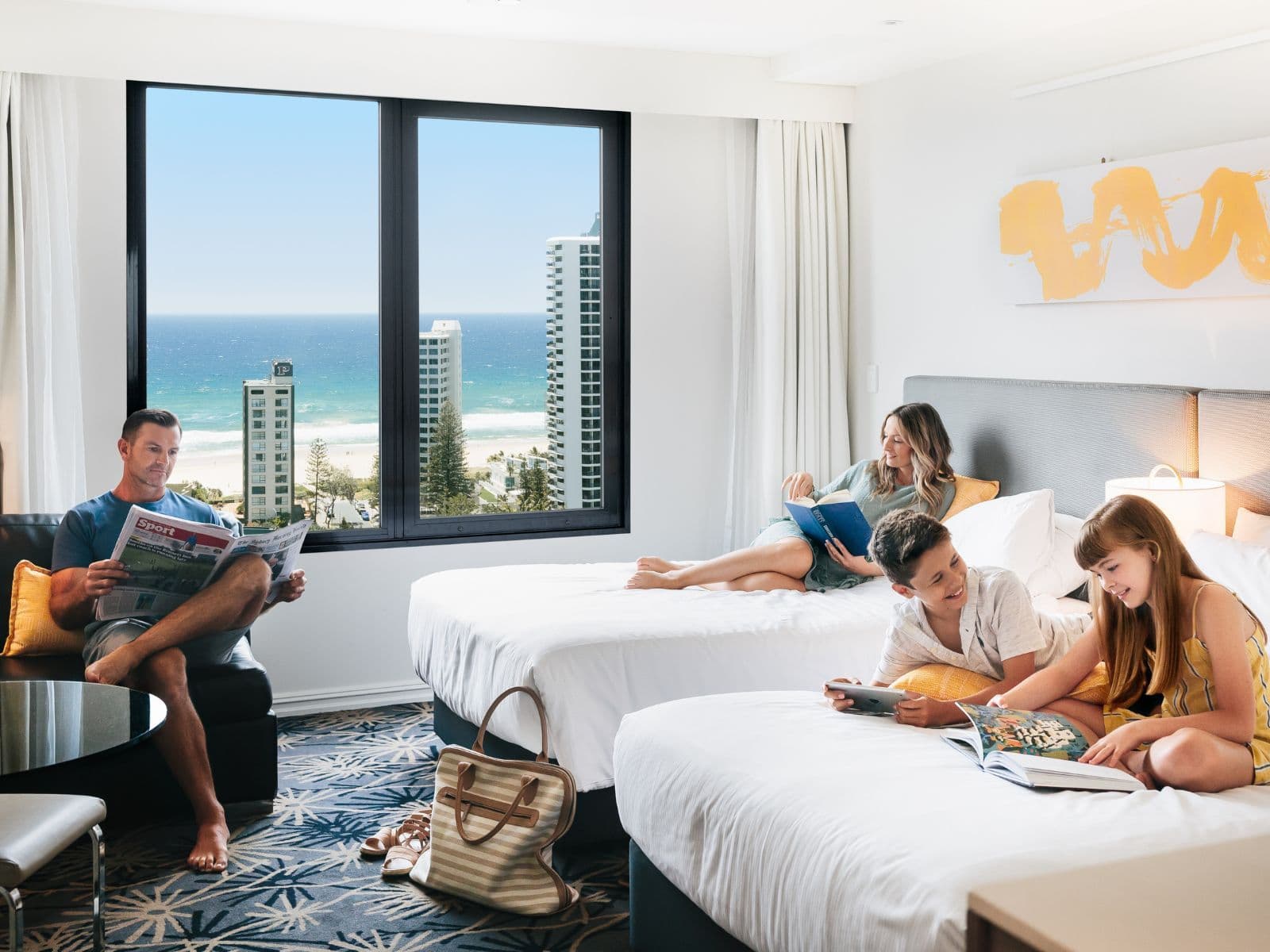 family happy in hotel room