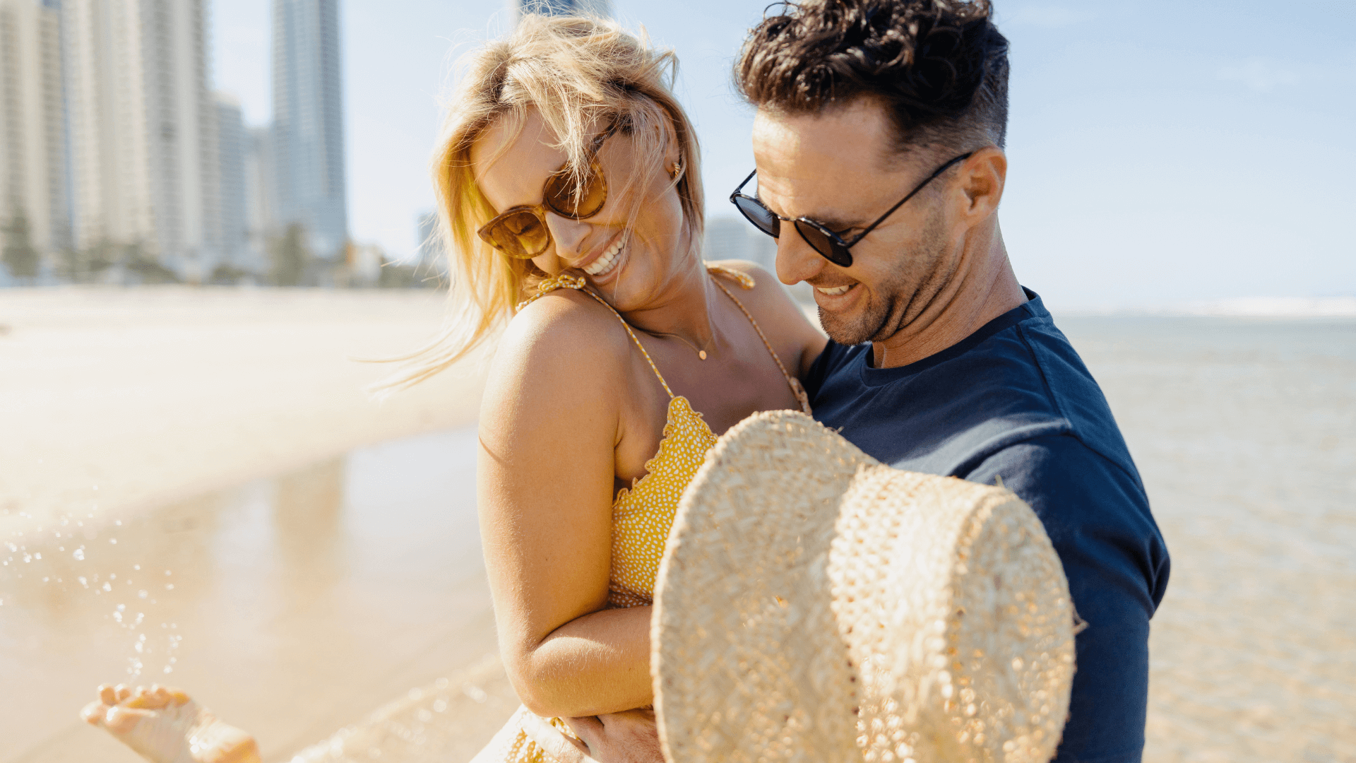 couple-hugging-on-beach