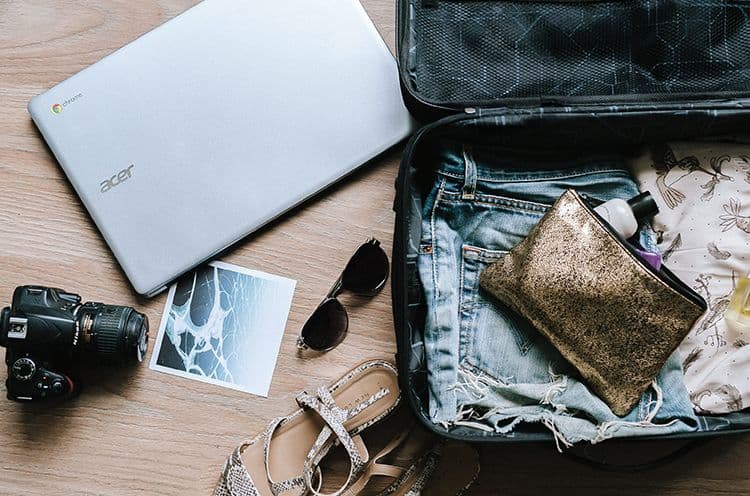 A Bag Of Luggage Sitting On Top Of A Table